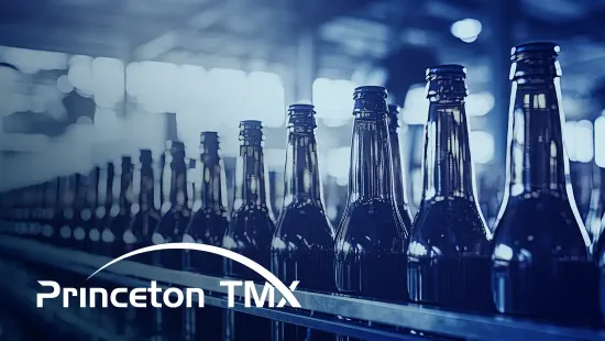 Bottles on a conveyor belt. The Princeton TMX logo is displayed in the bottom left of the image.